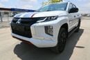 ميتسوبيشي L200 ميتسوبيشي L200 ديزل فل أوبشن أوتوماتيك 2.4 لتر أبيض من الخارج أسود من الداخل