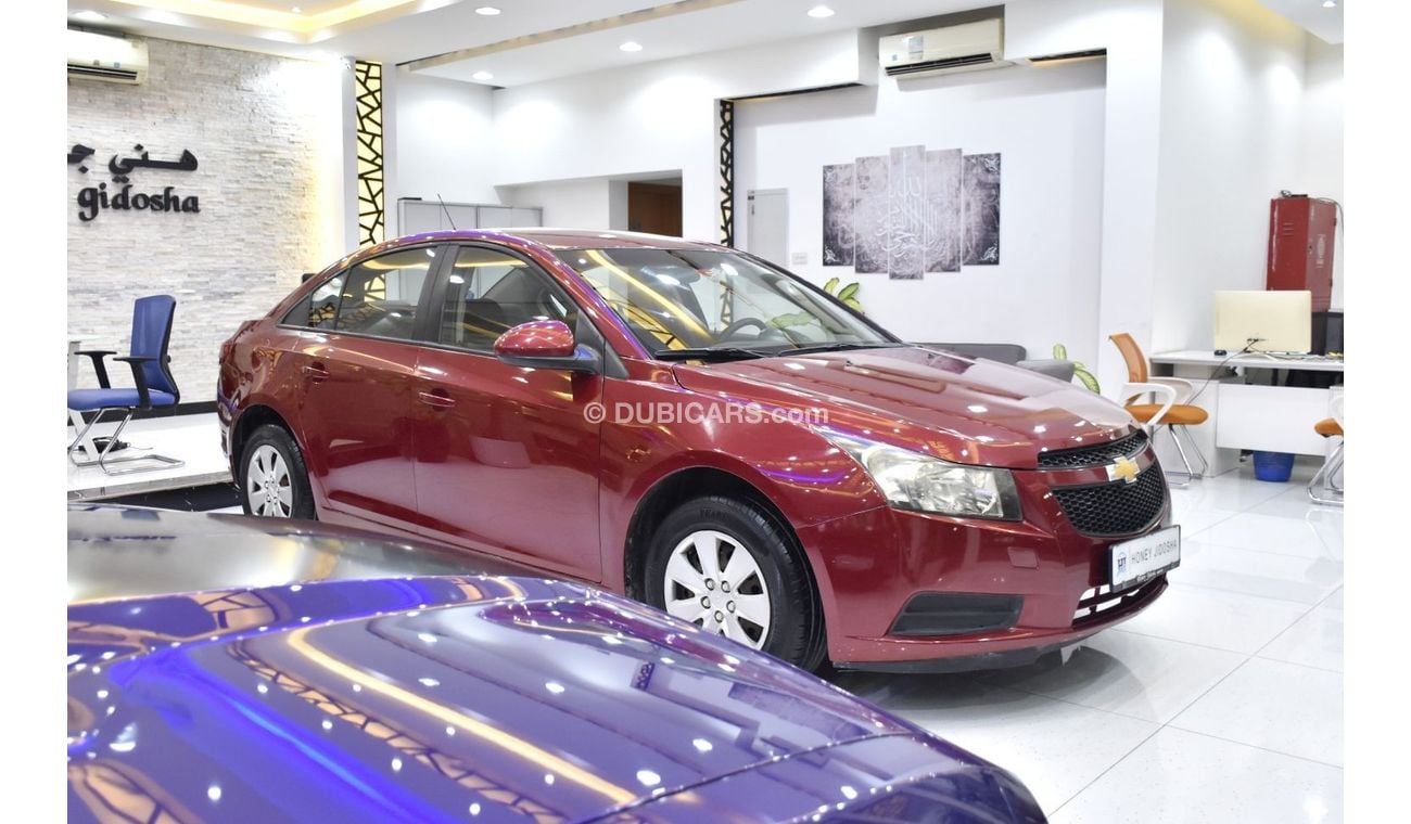 Chevrolet Cruze EXCELLENT DEAL for our Chevrolet Cruze LS ( 2012 Model ) in Red Color GCC Specs