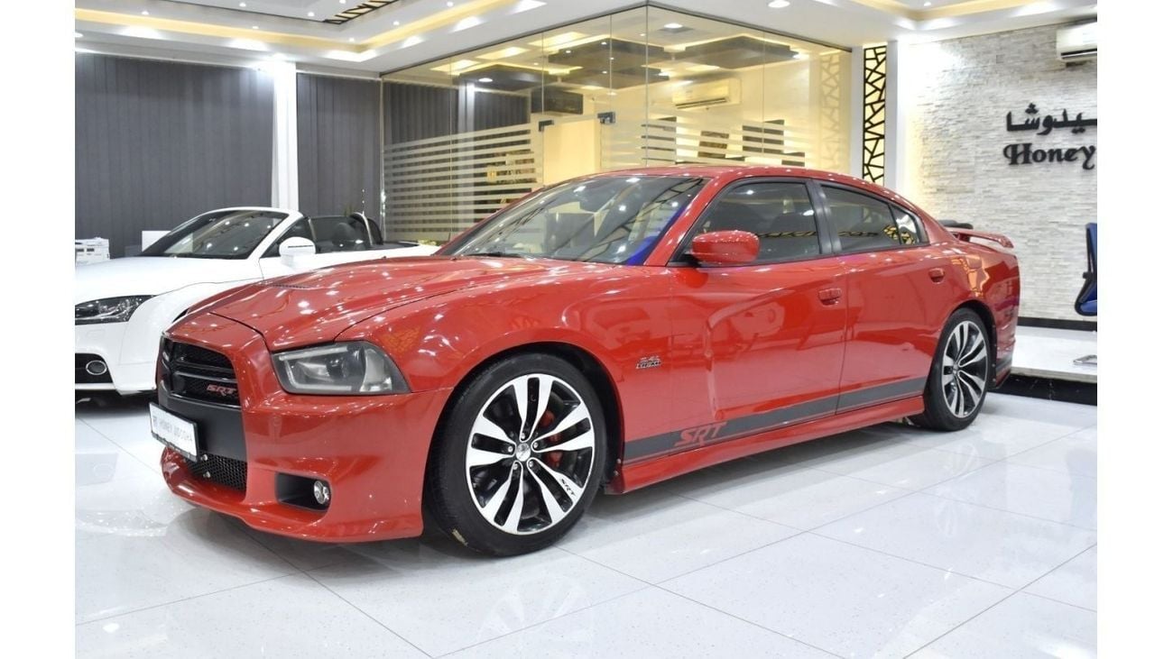 Dodge Charger EXCELLENT DEAL for our Dodge Charger SRT8 6.4 HEMI ( 2014 Model ) in Red Color GCC Specs