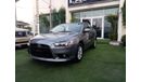 Mitsubishi Lancer Gulf gray color, inside beige without accidents, rear wing sensors, fog lights, in excellent conditi