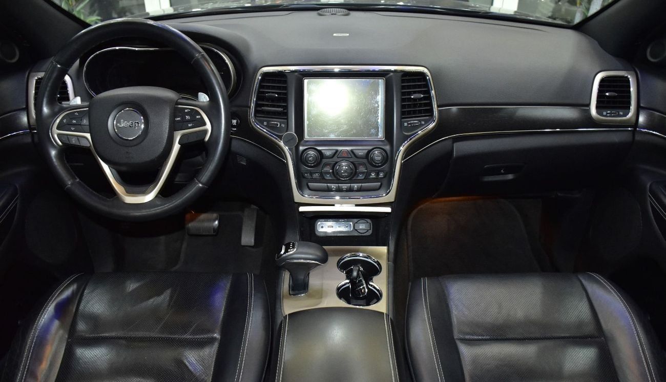 Jeep Grand Cherokee EXCELLENT DEAL for our Jeep Grand Cherokee Limited 4x4 ( 2015 Model ) in Grey Color GCC Specs