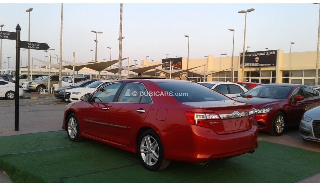 تويوتا كامري تويوتا كامرى عنابى خليجى 2013 فتحة سقف فول ابشن بحالة جيدة