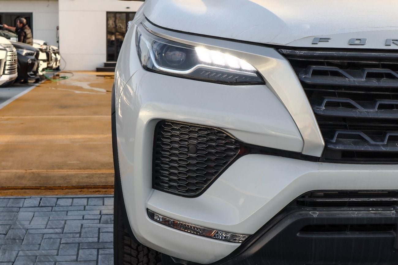 Toyota Fortuner EXR 2.7L (160 HP)  Toyota Fortuner (TGN156) – 2.7L Petrol – SR5 – 4WD – White – 2025 Model