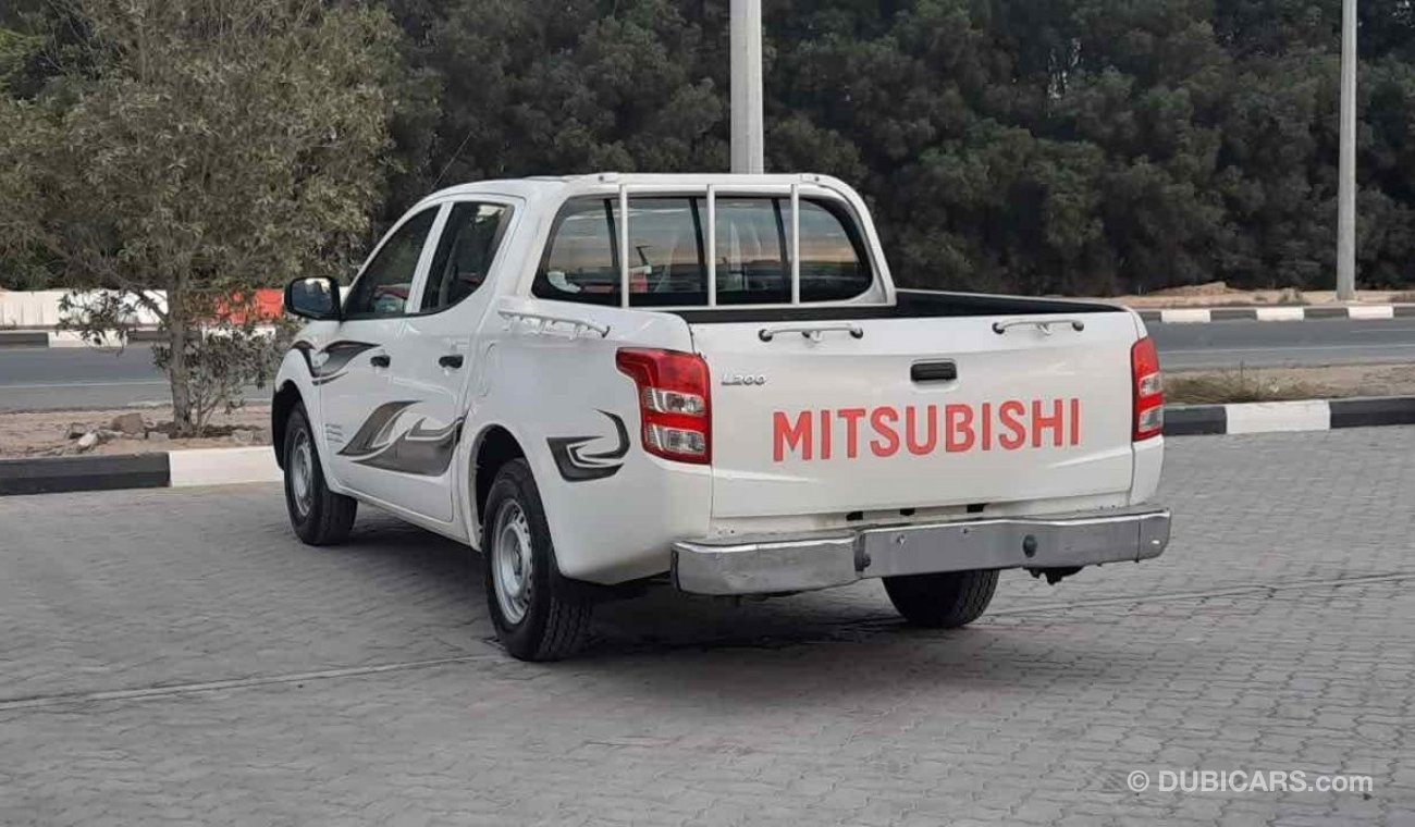 Mitsubishi L200 4x2 - 2016. Petrol Ref#133