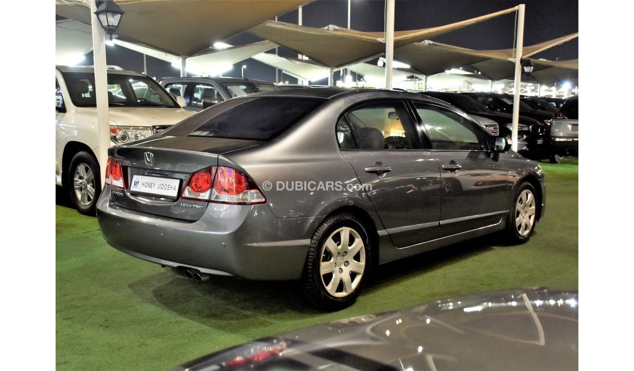 Honda Civic EXCELLENT DEAL for our Honda Civic 1.8 i-VTEC ( 2009 Model ) in Grey Color GCC Specs