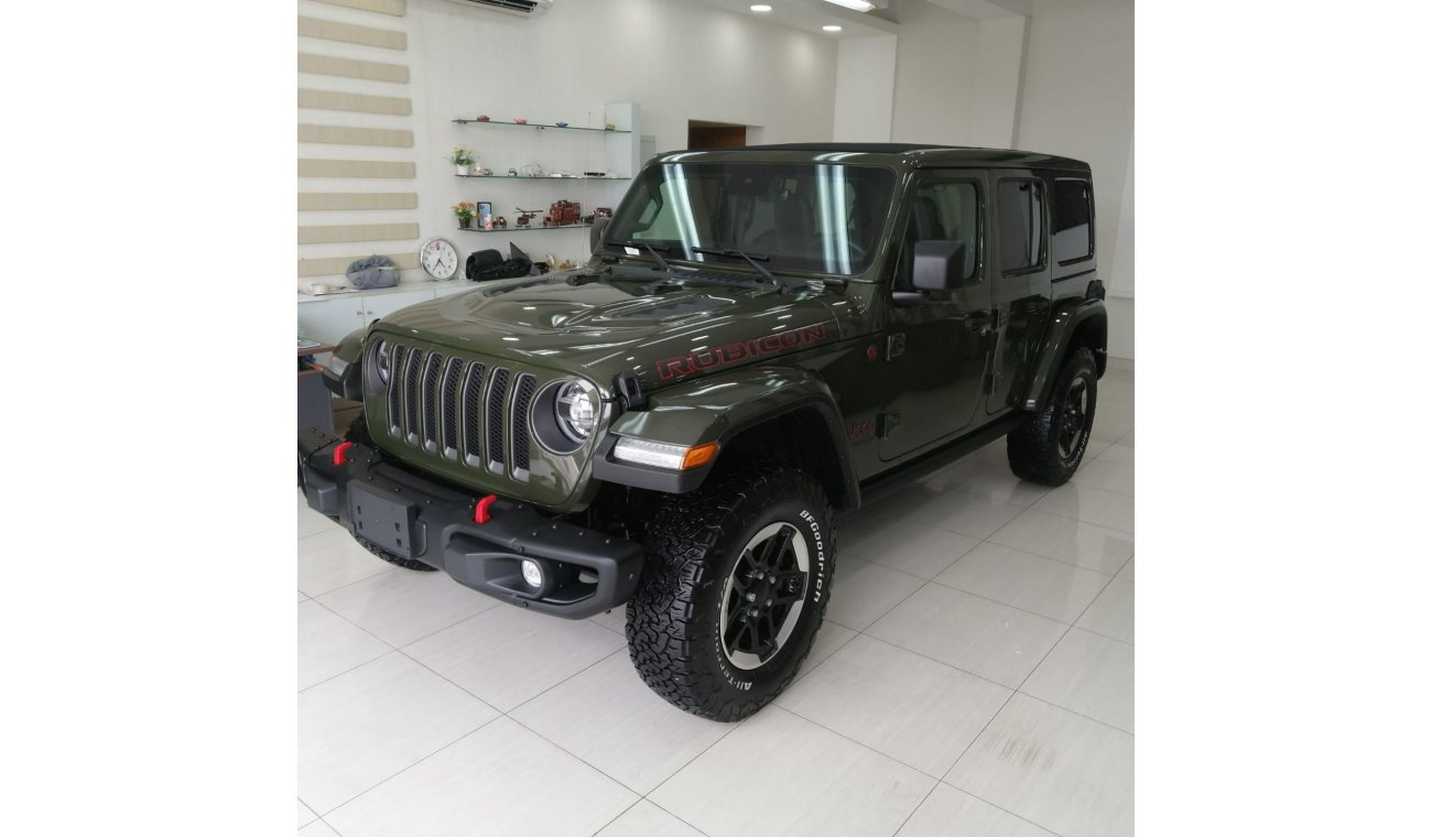 Used Rubicon JEEP WRANGLER RUBICON 2021 GREEN V4  L 14000 KM REAR  CAMERA BLACK LEATHER INTERIOR PAR 2021 for sale in Sharjah - 530200