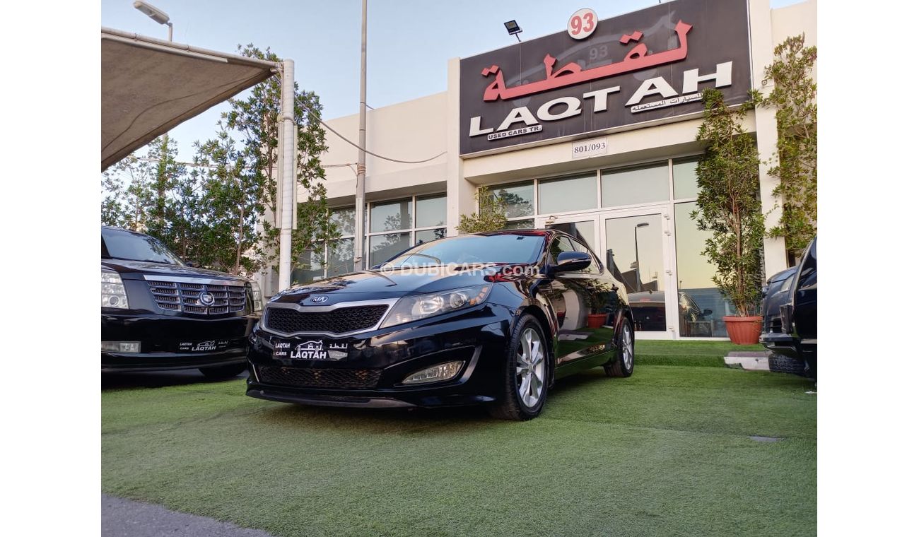 كيا أوبتيما موديل 2012 وارد أمريكى بانوراما مثبت سرعة تحكم خشب رنجات حساسات بحالة ممتازة