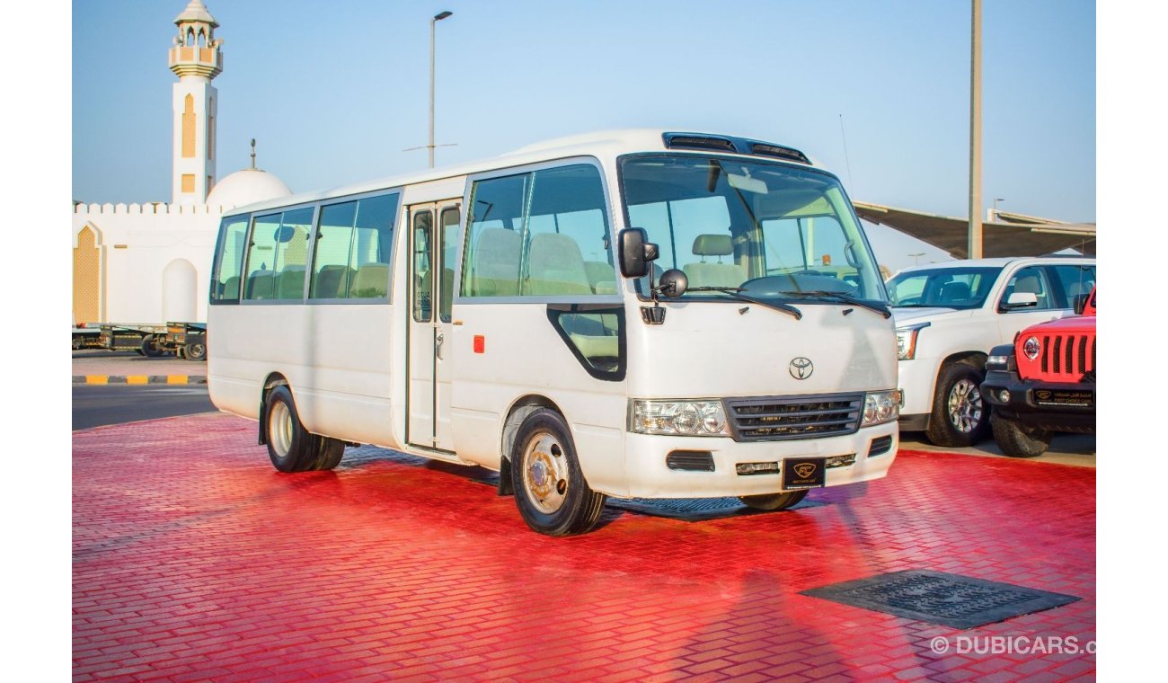 تويوتا كوستر 2014 | TOYOTA COASTER | STD ROOF | 30-SEATER GCC | MANUAL TRANSMISSION | VERY WELL-MAIN