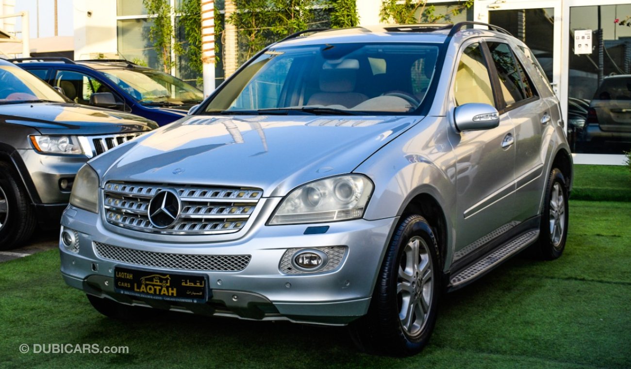 مرسيدس بنز ML 350 خليجى - رقم واحد - فتحة - جلد - كاميرا -شاشة - تحكم - مثبت سرعة - كرسى كهرباء - رنجات - حساسات