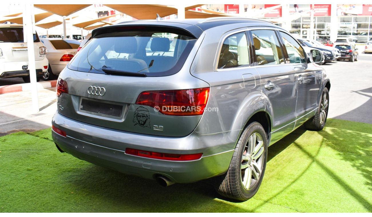 Audi Q7 2009 GCC model, silver color, saffron interior, leather panorama, cruise control, sensor wheels, in