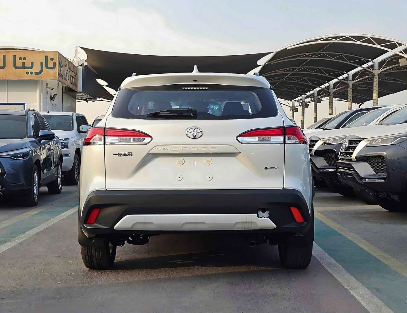 Toyota Corolla Cross HYBRID FULL OPTION / 2.0L V4 / LEATHER + ELECTRIC SEAT / MUD GUARD /SUNROF / CODE # HYBRID