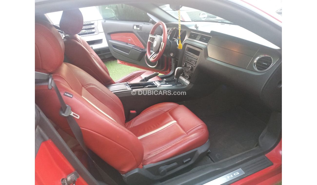 Ford Mustang 2014 GCC model, coupe, cruise control, rear camera, leather rear spoiler, in excellent condition