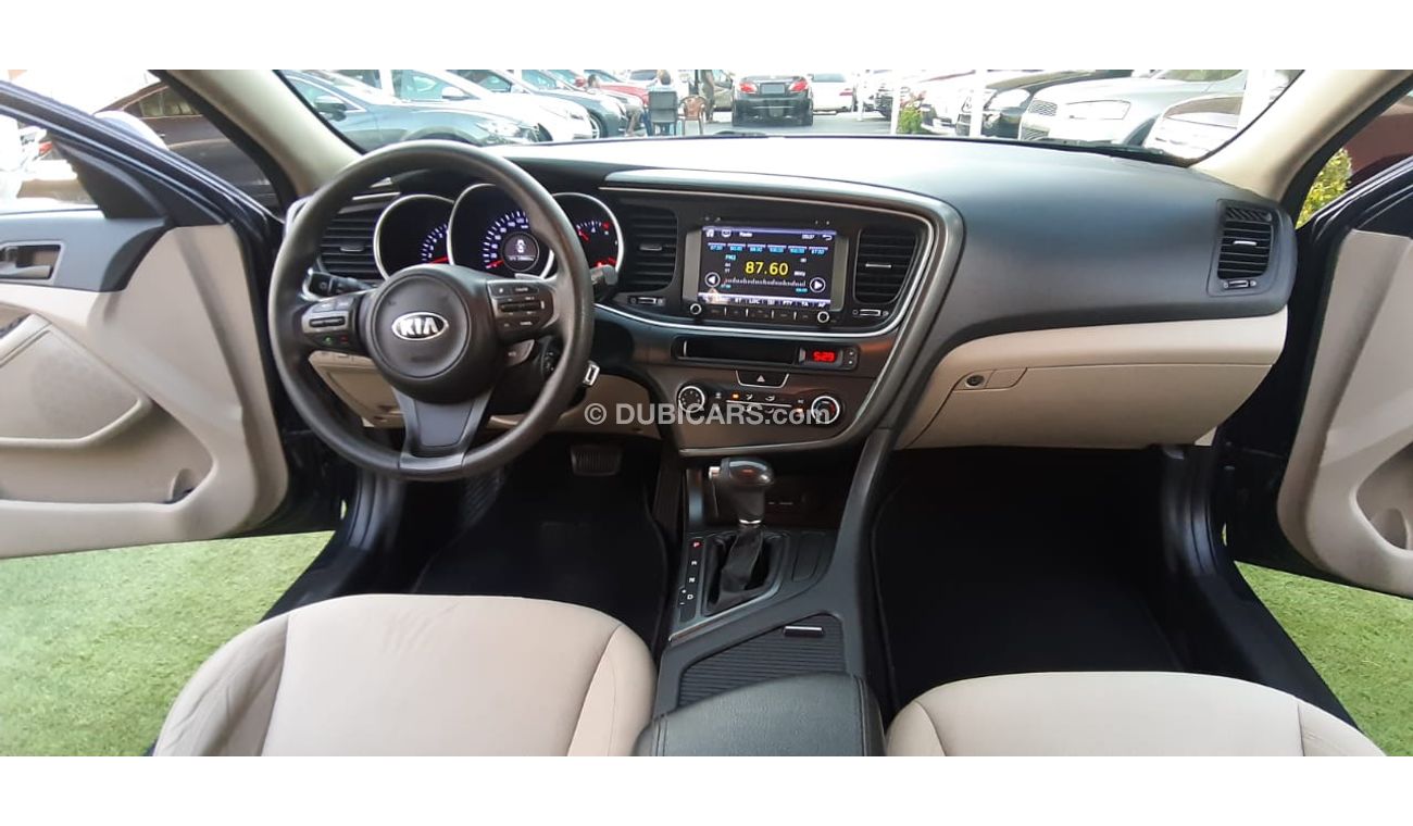 كيا أوبتيما خليجى رقم 2  شاشة   كاميرا  مثبت  سرعة  جناح خلفى رنجات حساسات أنوار ضباب بحالة ممتازة