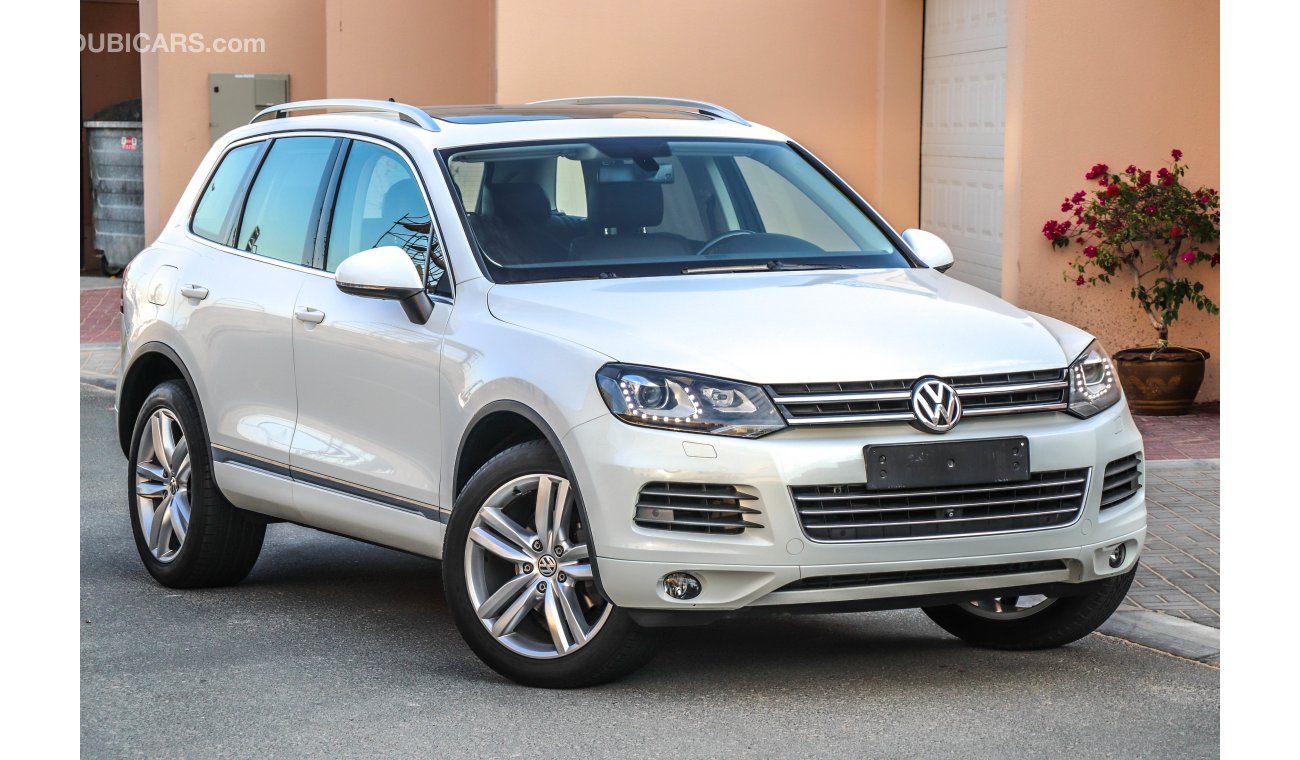 Volkswagen Touareg Sport 2013 GCC under 2 years Warranty with Zero downpayment.