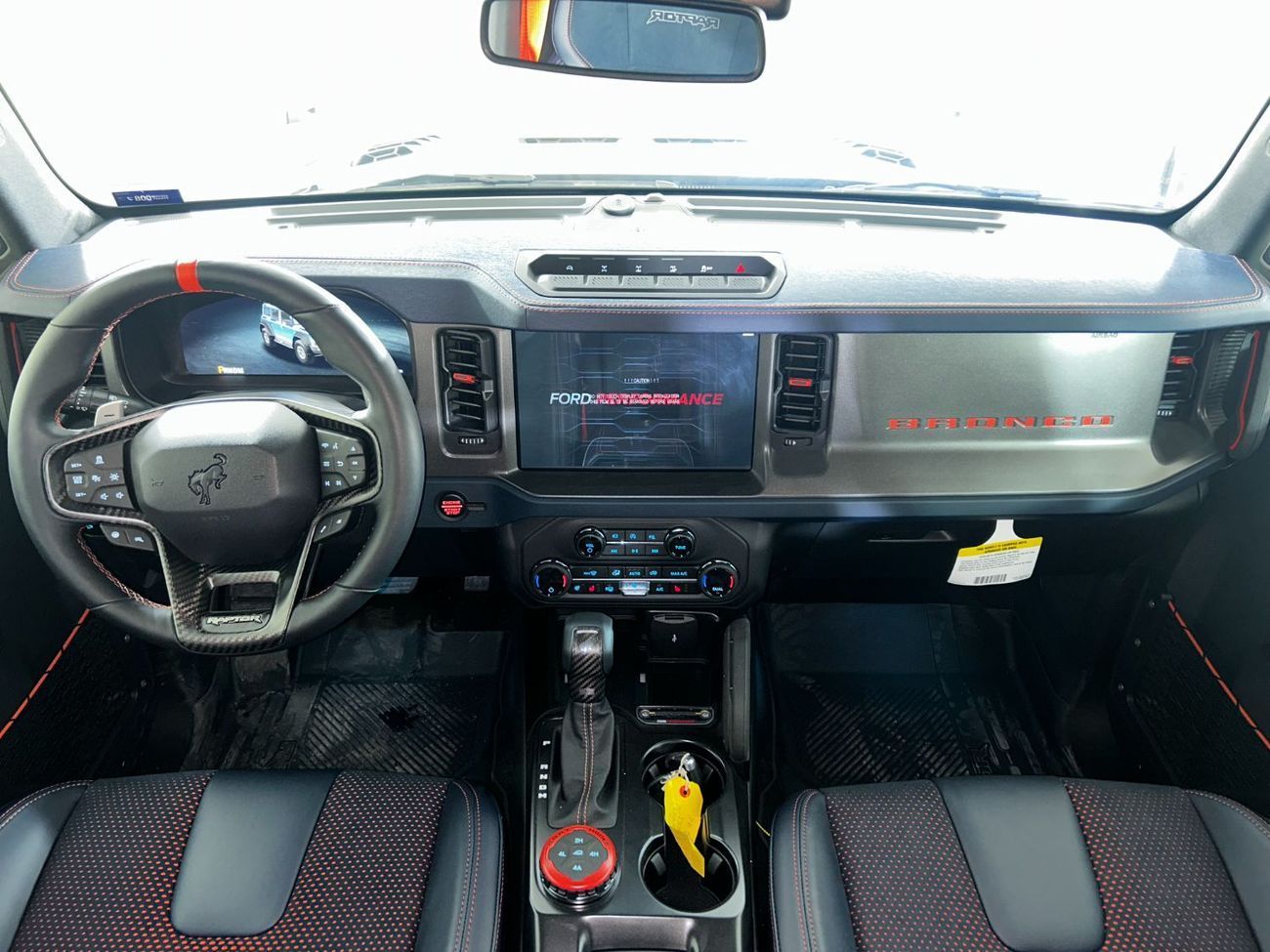 Ford Bronco Raptor B4D4925 BRONCO 4 DOORS RAPTOR 3.0L V6 ECOBOOST W/ ORANGE SBELTS BLACK/BLUE LTHR SSQTCH