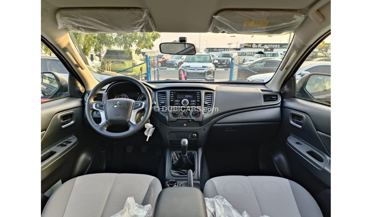 Mitsubishi L200 GLX 2.5L Diesel / M/T / 4WD / Black Rims / Streering Vol Control (Code # L2DDB)