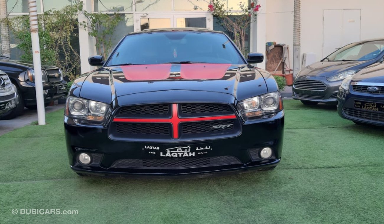 Dodge Charger GCC SRT - No.1 - hatch - leather - wheels - sensors - screen - rear wing in excellent condition,