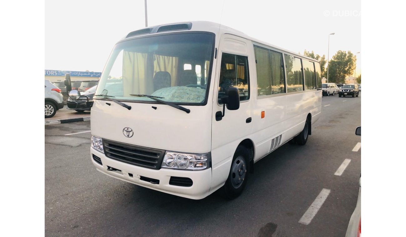 Toyota Coaster 30 Seater - Full Air Condition - Clean interior & exterior - Special price for ANGOLA