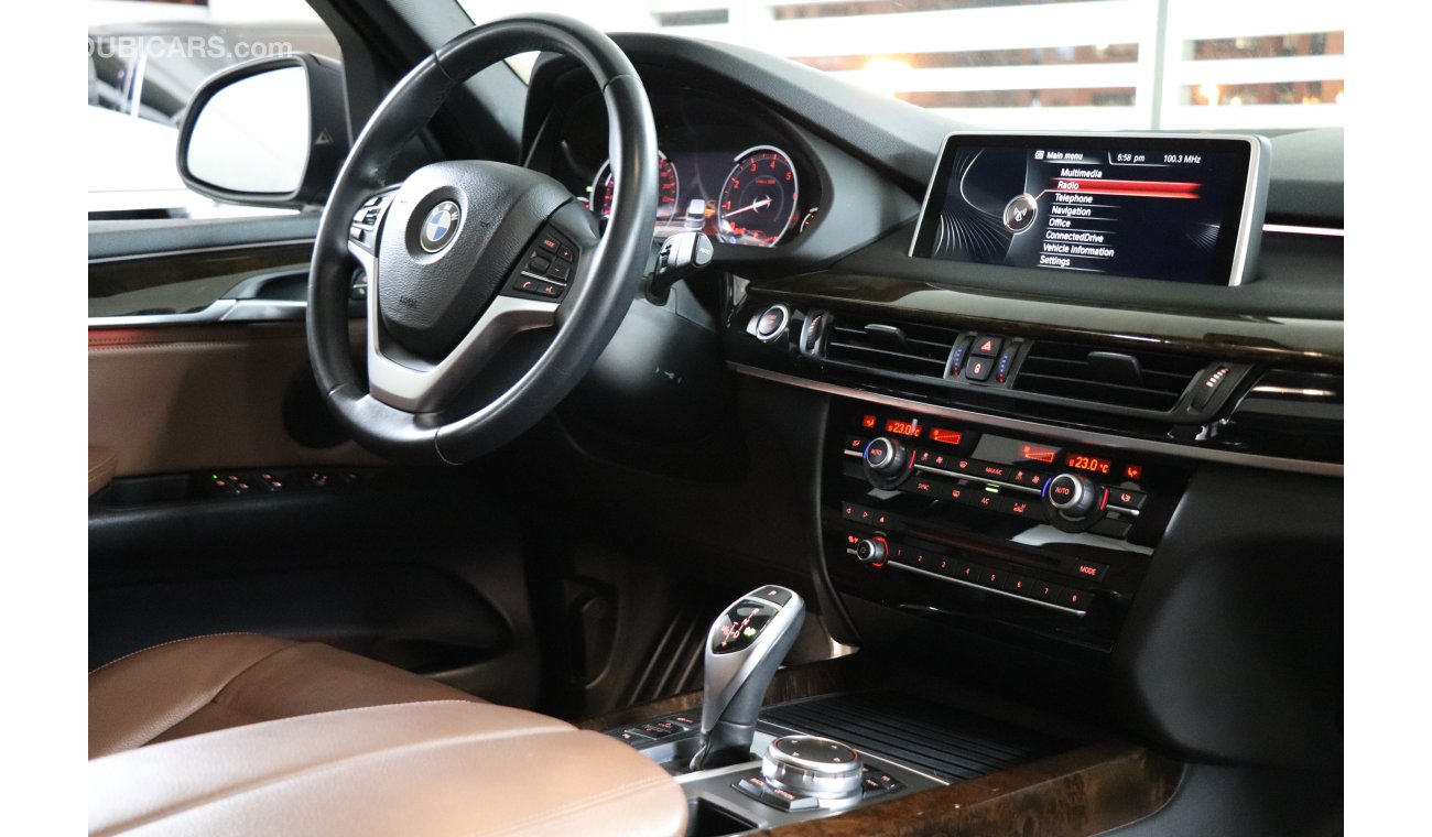 BMW X5 X-Drive 35i 2015 GCC under Agency Warranty with Zero Down-Payment.