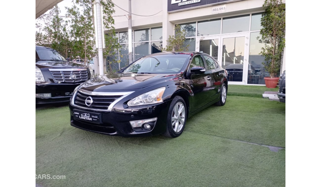 Nissan Altima Model 2013 GCC, fingerprint cruise control, wheels, sensors, screen, camera, in excellent condition