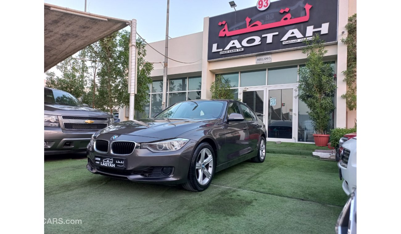 BMW 316i Model 2013 Gulf Brown BM316i color Cruise control, wheels control in excellent conditiona