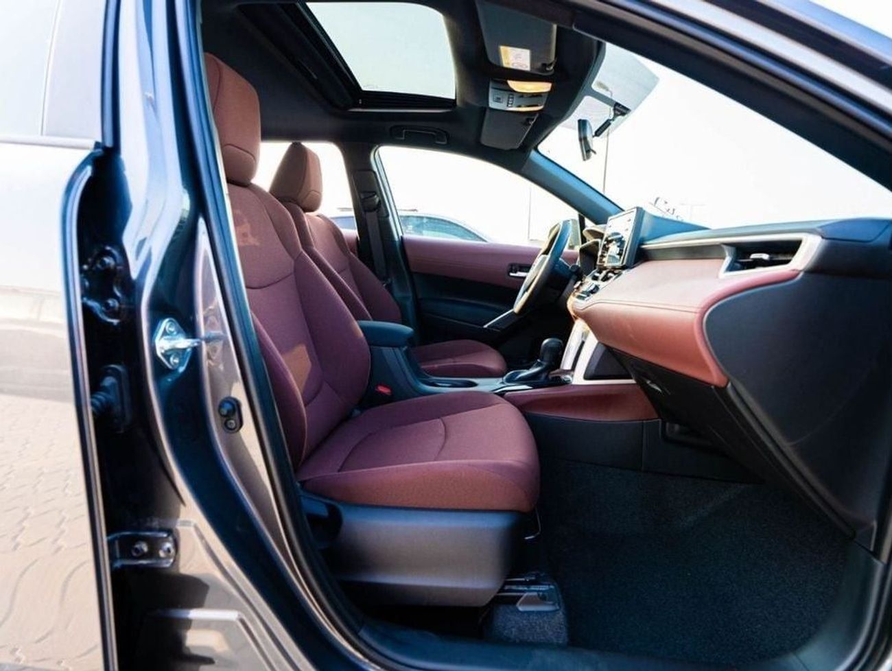 تويوتا كورولا كروس 2024 TOYOTA COROLLA CROSS 1.8 Hybrid MID - GREY METTALIC inside RED | Export Only