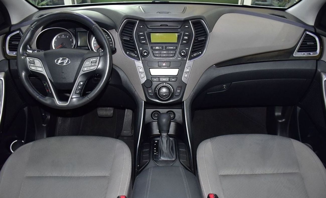 Hyundai Santa Fe EXCELLENT DEAL for our Hyundai SantaFe 4WD V6 ( 2016 Model ) in Silver Color GCC Specs