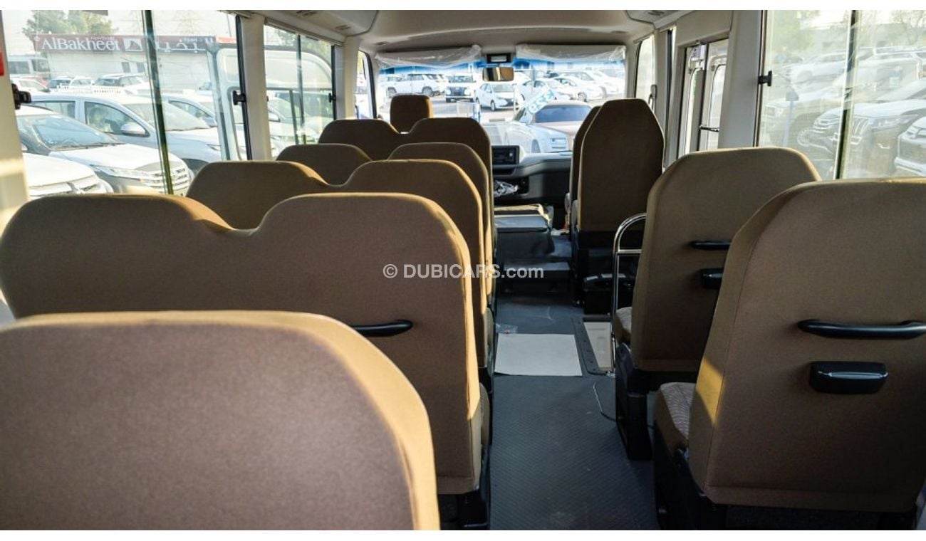 تويوتا كوستر 4.2L V6 M/T Diesel 23 passengers - 16″ wheels - brown interior