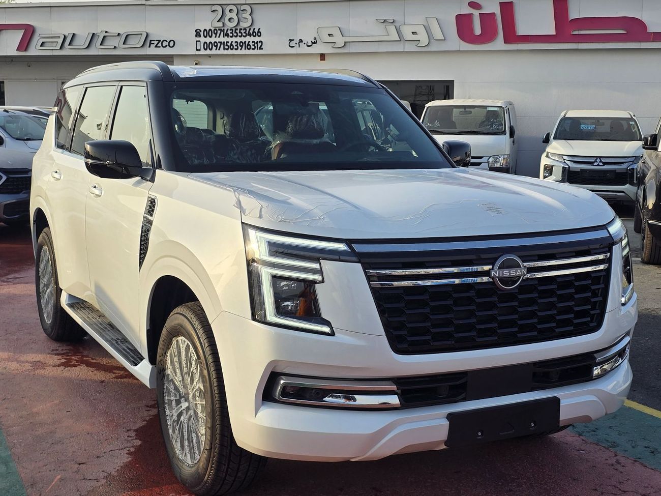 نيسان باترول Nissan Patrol Platinum SE 3.8L Petrol 4WD Gcc  white insid red 2026 Model