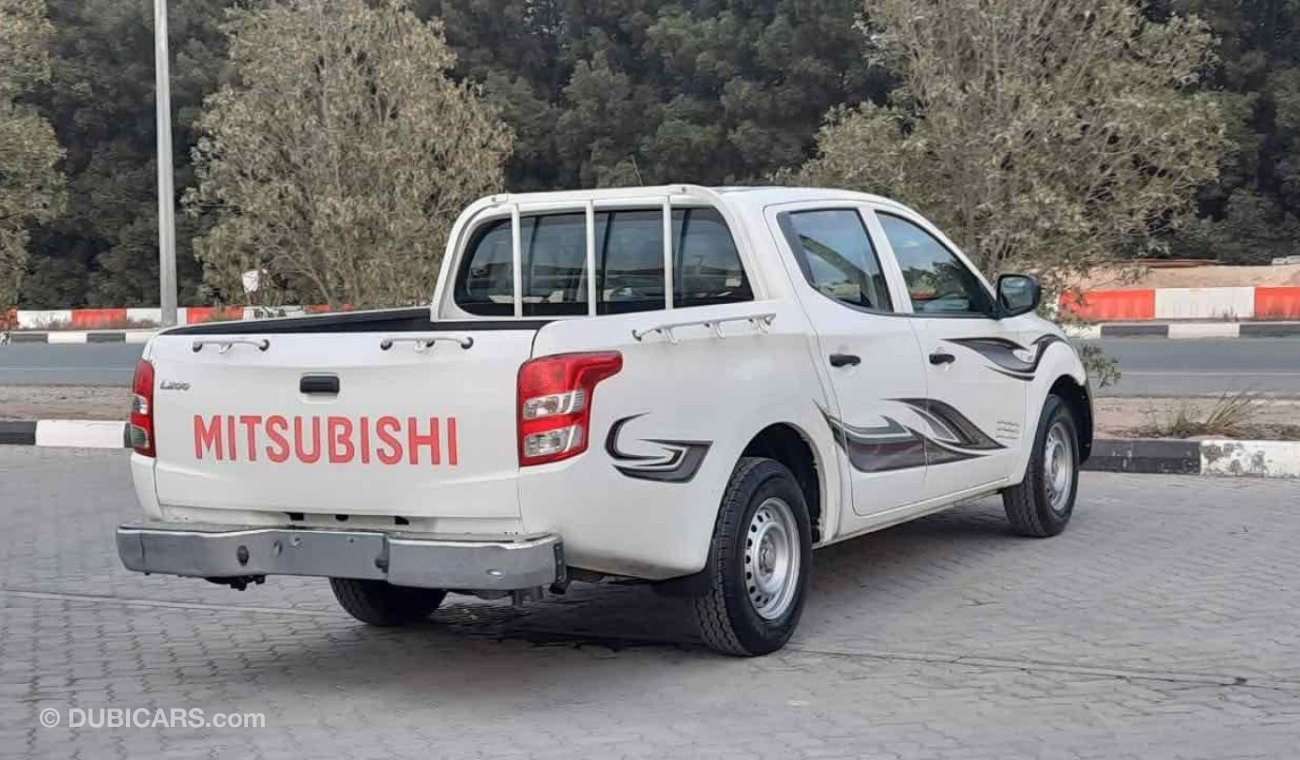 Mitsubishi L200 4x2 - 2016. Petrol Ref#133