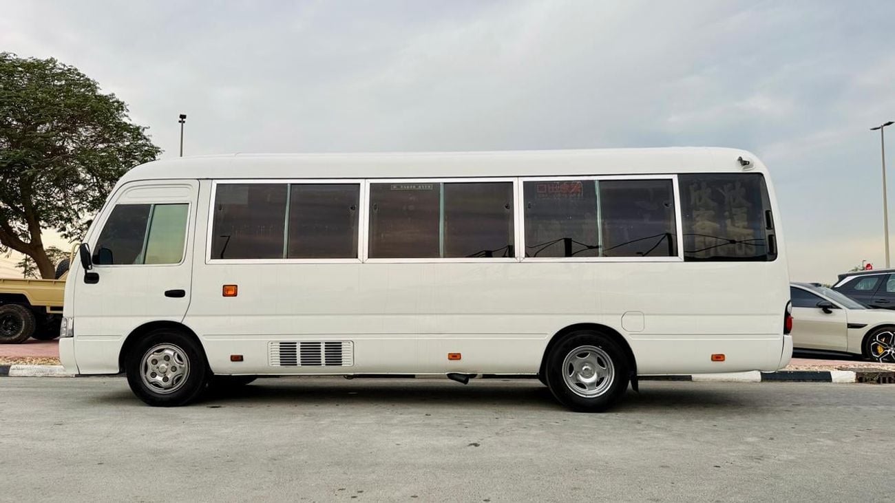 Toyota Coaster Fully luxury seats fully covered by cameras