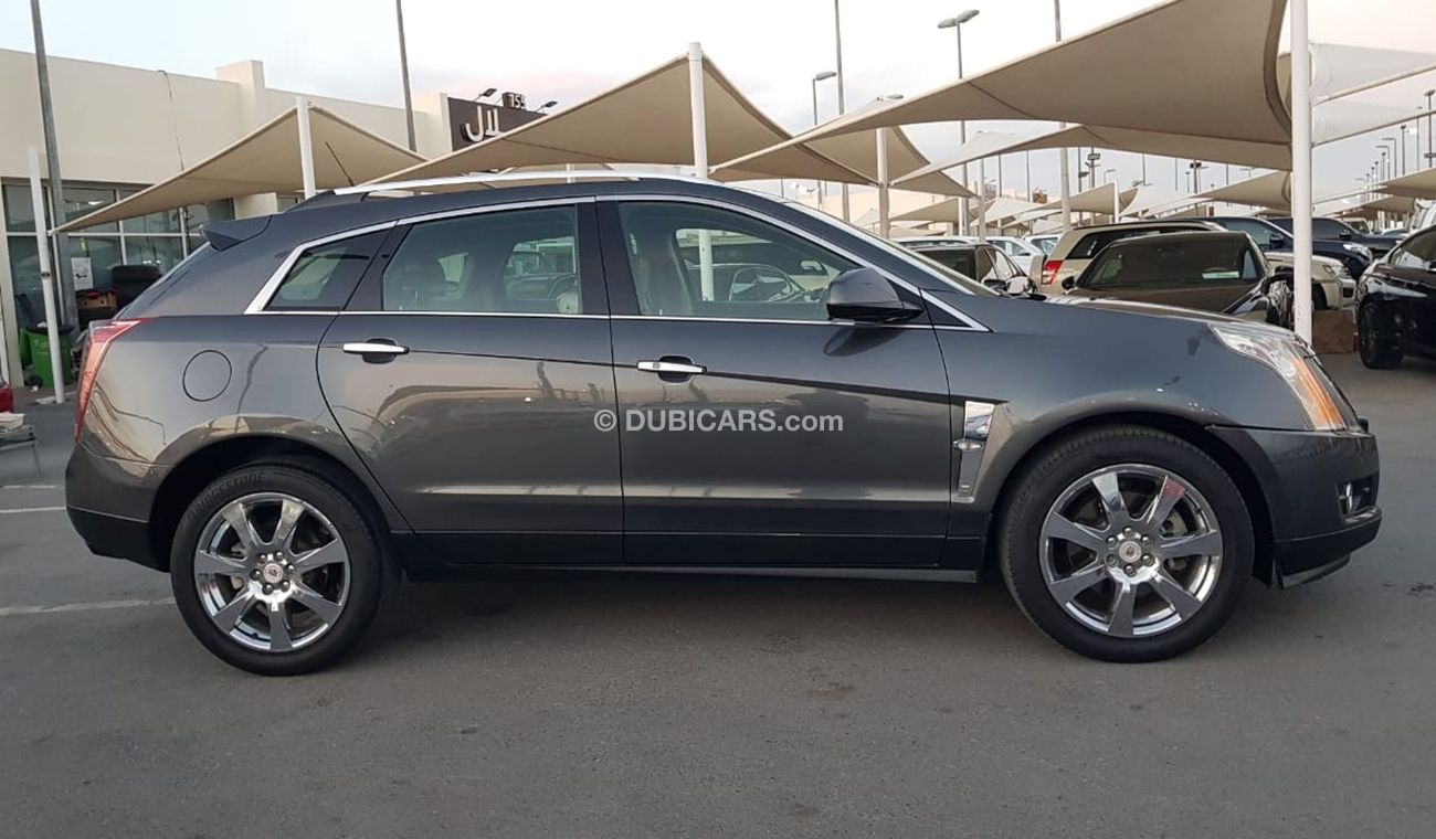 كاديلاك SRX موديل 2011 خليجي فل مواصفات كراسي جلد ومثبت سرعه وتحكم كهربي كامل ونظام صوت ممتاز وكاميرا خلفيه ومدخ