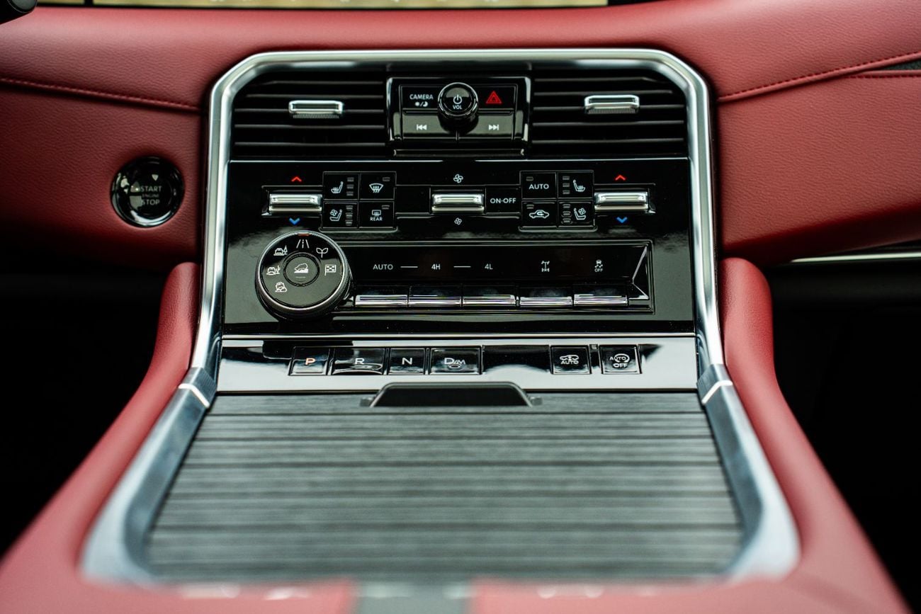 Nissan Patrol Nissan Patrol Platinum 2026 White roof black interior dark red and black