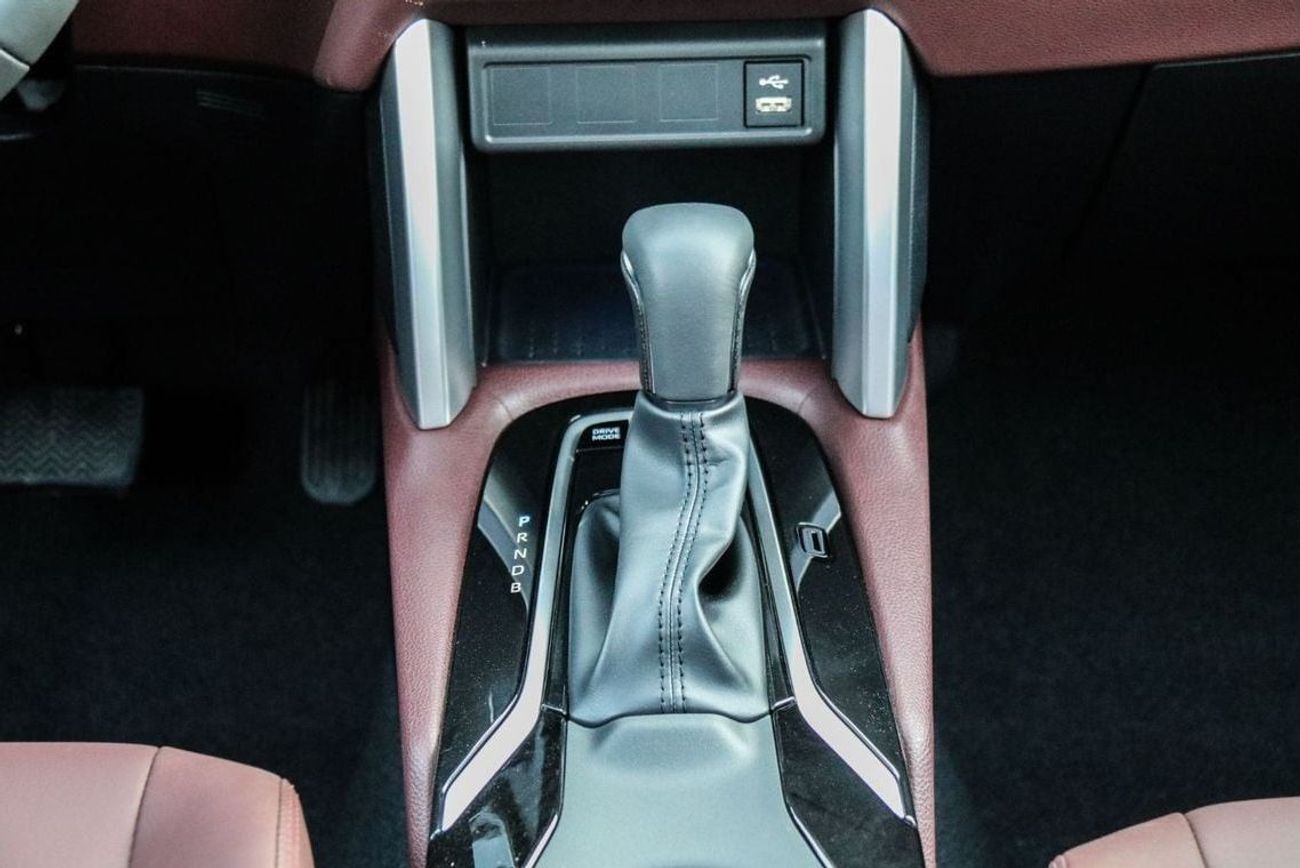 Toyota Corolla Cross Best offer for the new Corolla Cross Hybrid 2024 1.8L contact Now | Terra rosa color interior