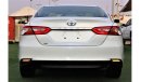 Toyota Camry SE SE Toyota Camry 2018 Toyota Camry 2018 The car is a Gulf agency dyed The car is white with a beig