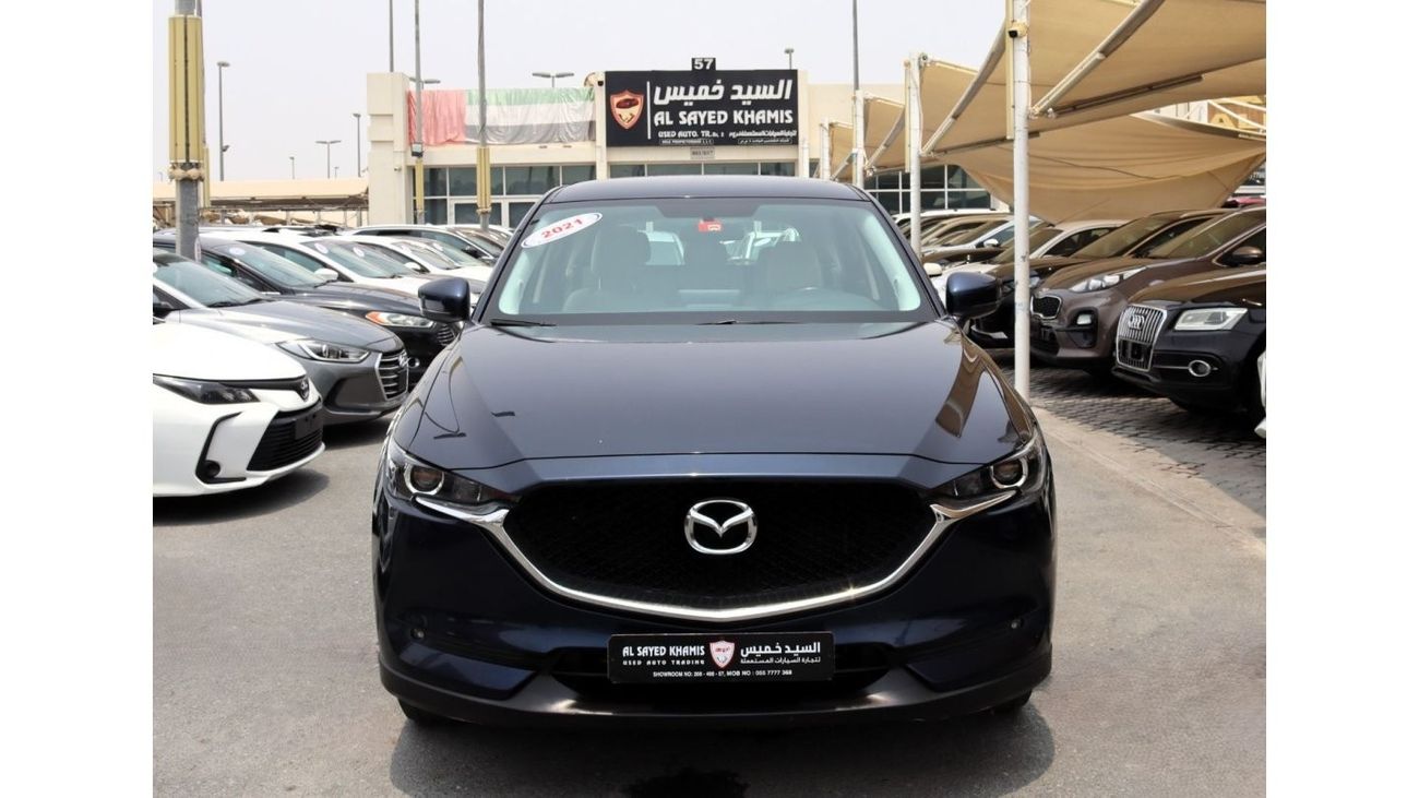 مازدا CX5 GL خالية من الحوادث - خليجي - صبغة وكالة - بحالة الوكالة من الداخل والخارج