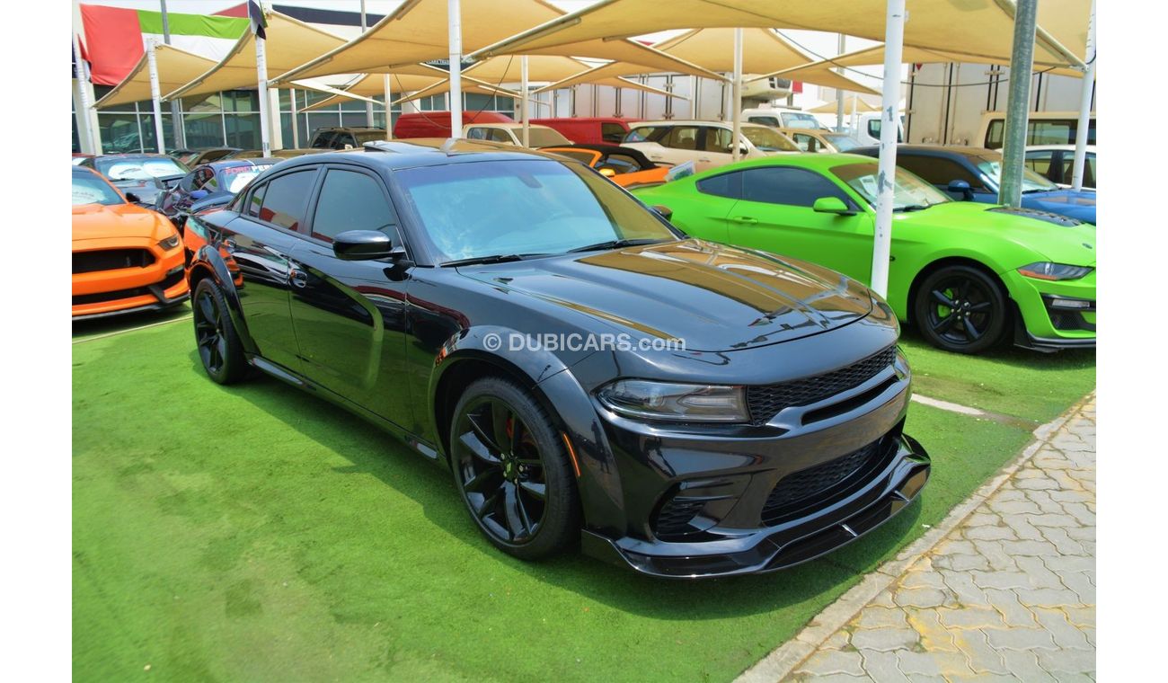 Dodge Charger 3.6L SXT (Mid) OFFER ONE WEEK//CHARGER SRT KIT//WIDE BODE//SUN ROOF//AIR BAGS/