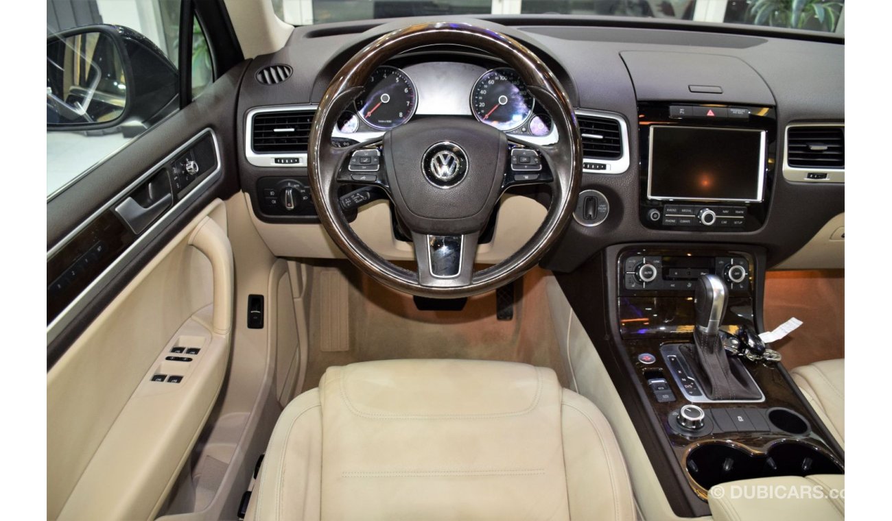 Volkswagen Touareg SEL EXCELLENT DEAL for our Volkswagen Touareg ( 2015 Model! ) in Blue Color! GCC Specs