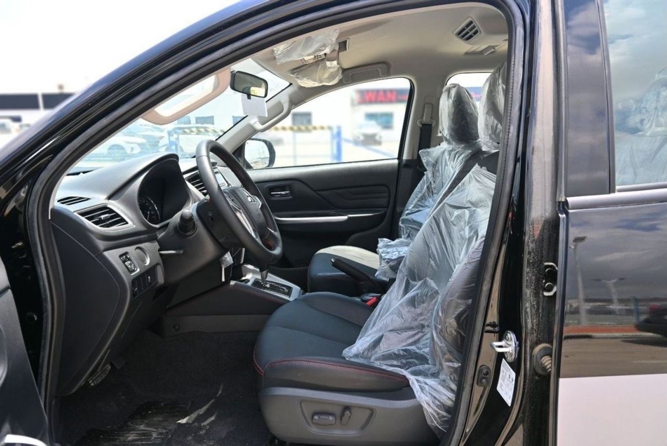 ميتسوبيشي L200 ميتسوبيشي L200 ديزل فل أوبشن أوتوماتيك 2.4 لتر أسود من الخارج أسود من الداخل