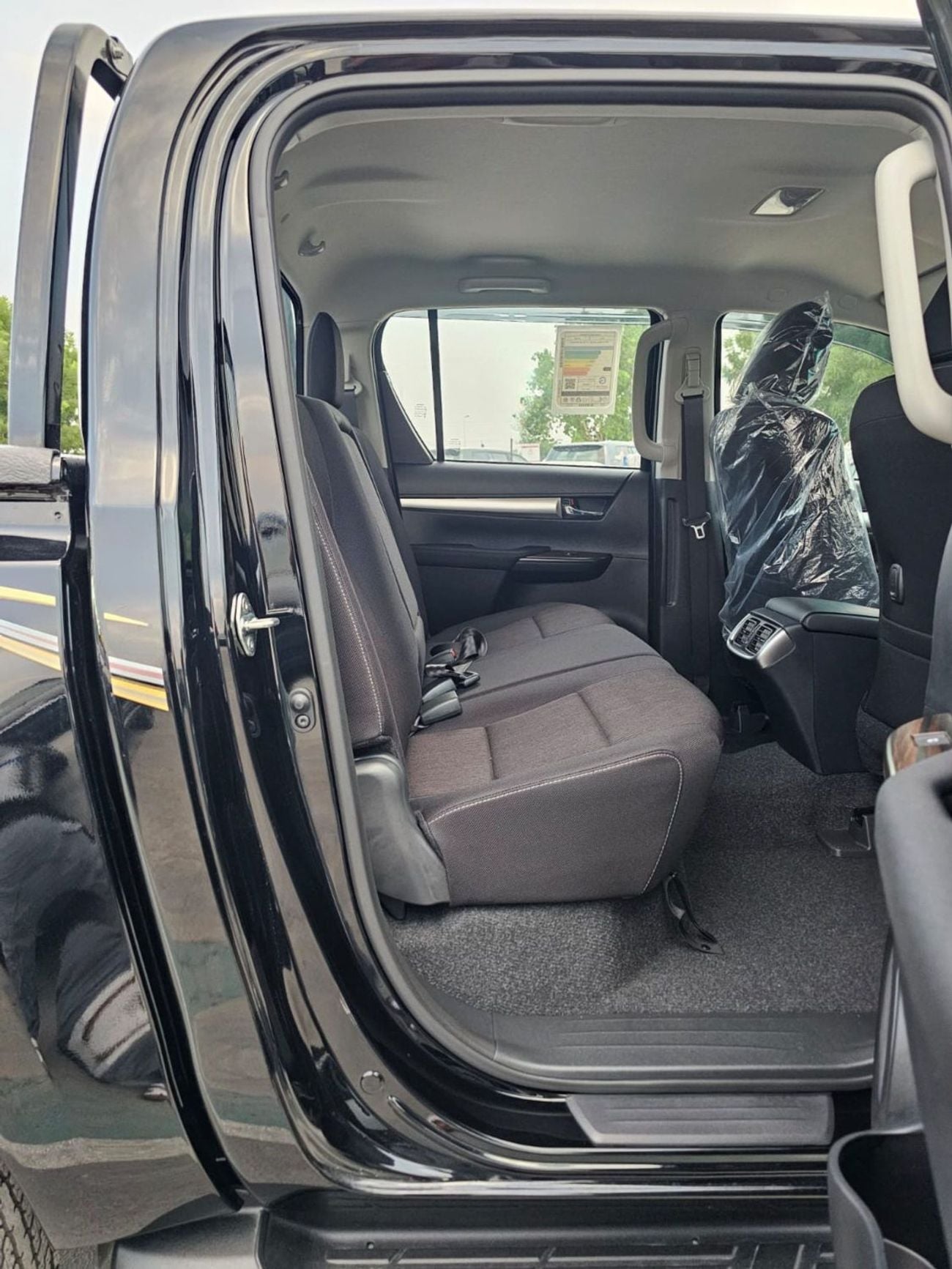 Toyota Hilux TOYOTA HILUX SR5 WIDE BODY DOUBLE CABIN || 2.7L PETROL A/T 4WD | BSM, WINOW VISOR, FOG LIGHTS, WOOD