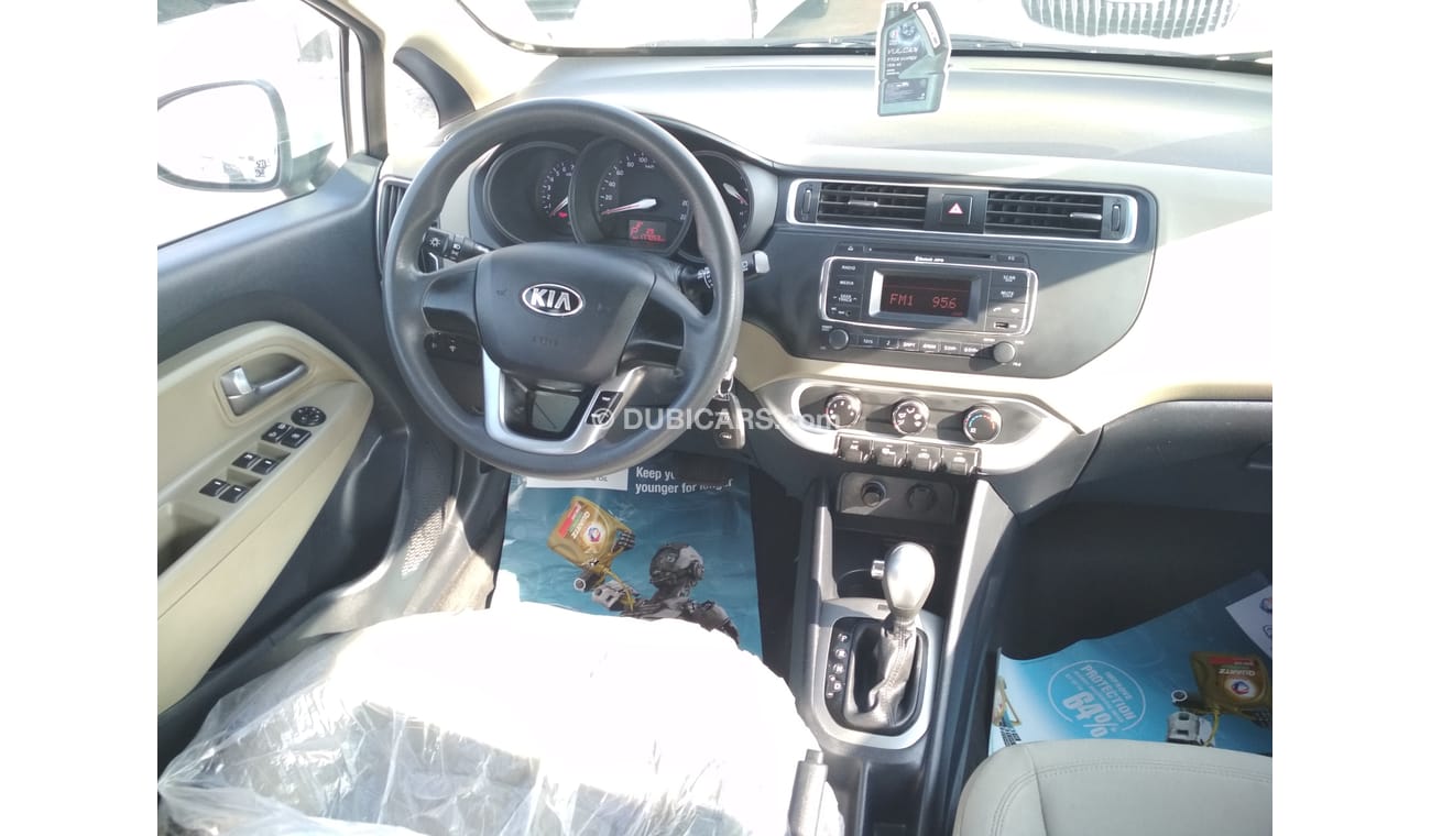 Kia Rio WHITE 2015 GCC NO PAINT NO ACCIDENT PERFECT