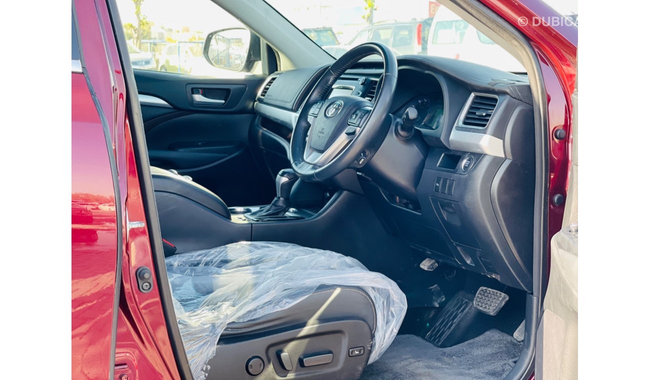 تويوتا كلوجير Toyota Kluger Petrol engine model FEB/2014 maroon color 7 seater  with push start and leather seats