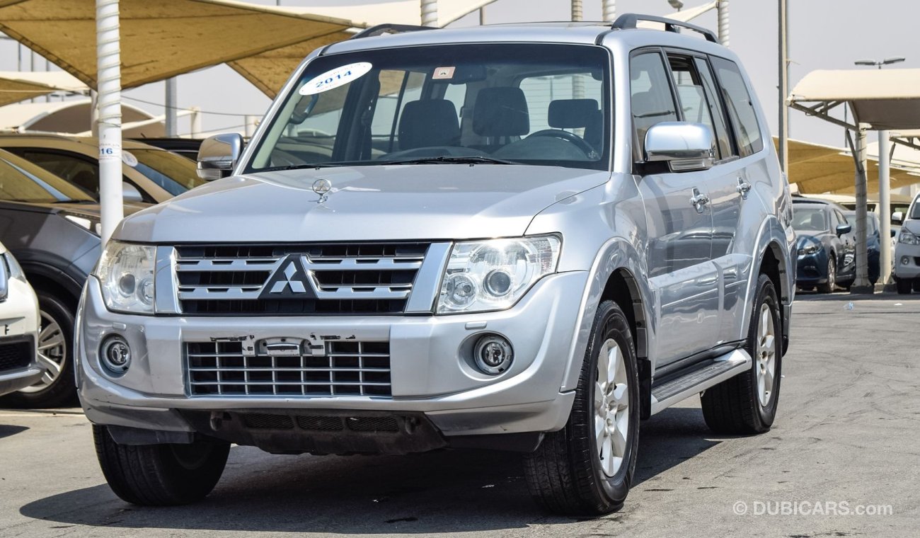 ميتسوبيشي باجيرو Pre-owned Mitsubishi Pajero GLS V6 for sale in Sharjah. Grey/Silver 2014 model, available at Wael Al