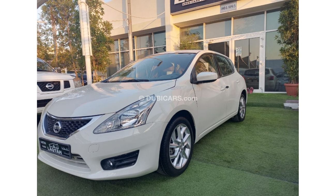 نيسان تيدا خليجى موديل 2013 لون أبيض شاشة كاميرا خلفية بدون حوادث بحالة ممتازة لاتحتاج لأى مصاريف