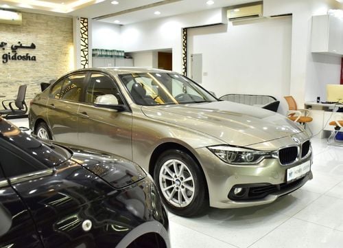BMW 318i STD EXCELLENT DEAL for our BMW 318i ( 2016 Model ) in Brown Color GCC Specs