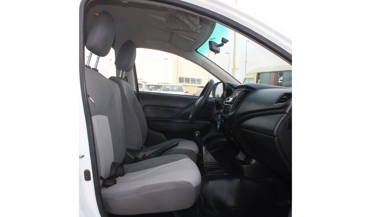 Mitsubishi L200 MITSUBISHI L200 WHITE GCC EXCELLENT CONDITION WITHOUT ACCIDENT