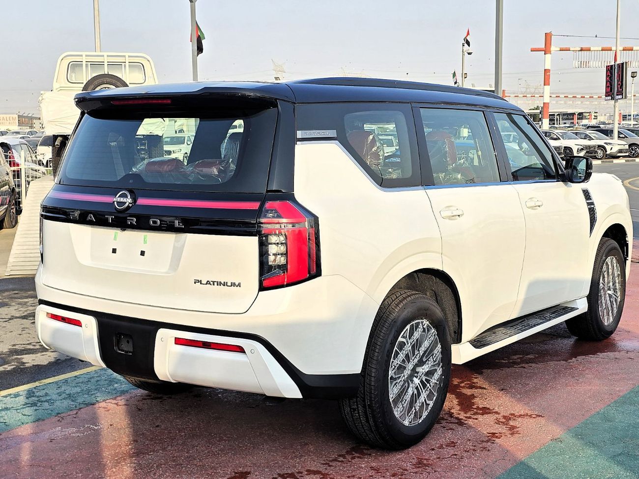 نيسان باترول Nissan Patrol Platinum SE 3.8L Petrol 4WD Gcc  white insid red 2026 Model