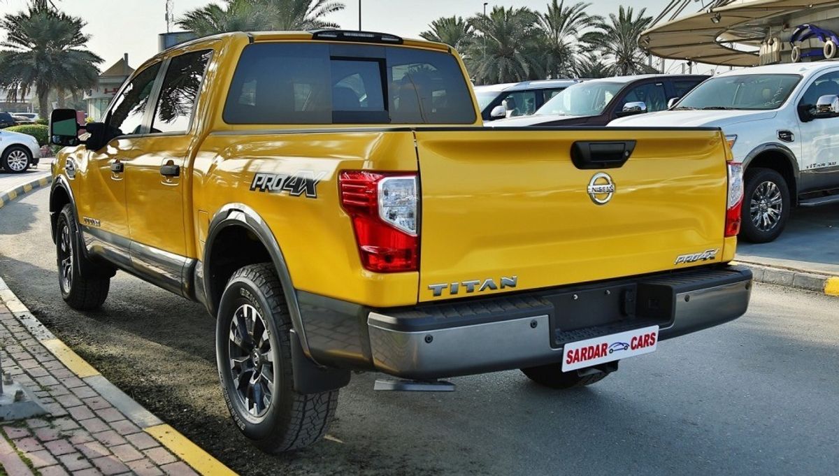 061 paint car sale: Titan Nissan for Pro 2017 Yellow, AED 180,000.