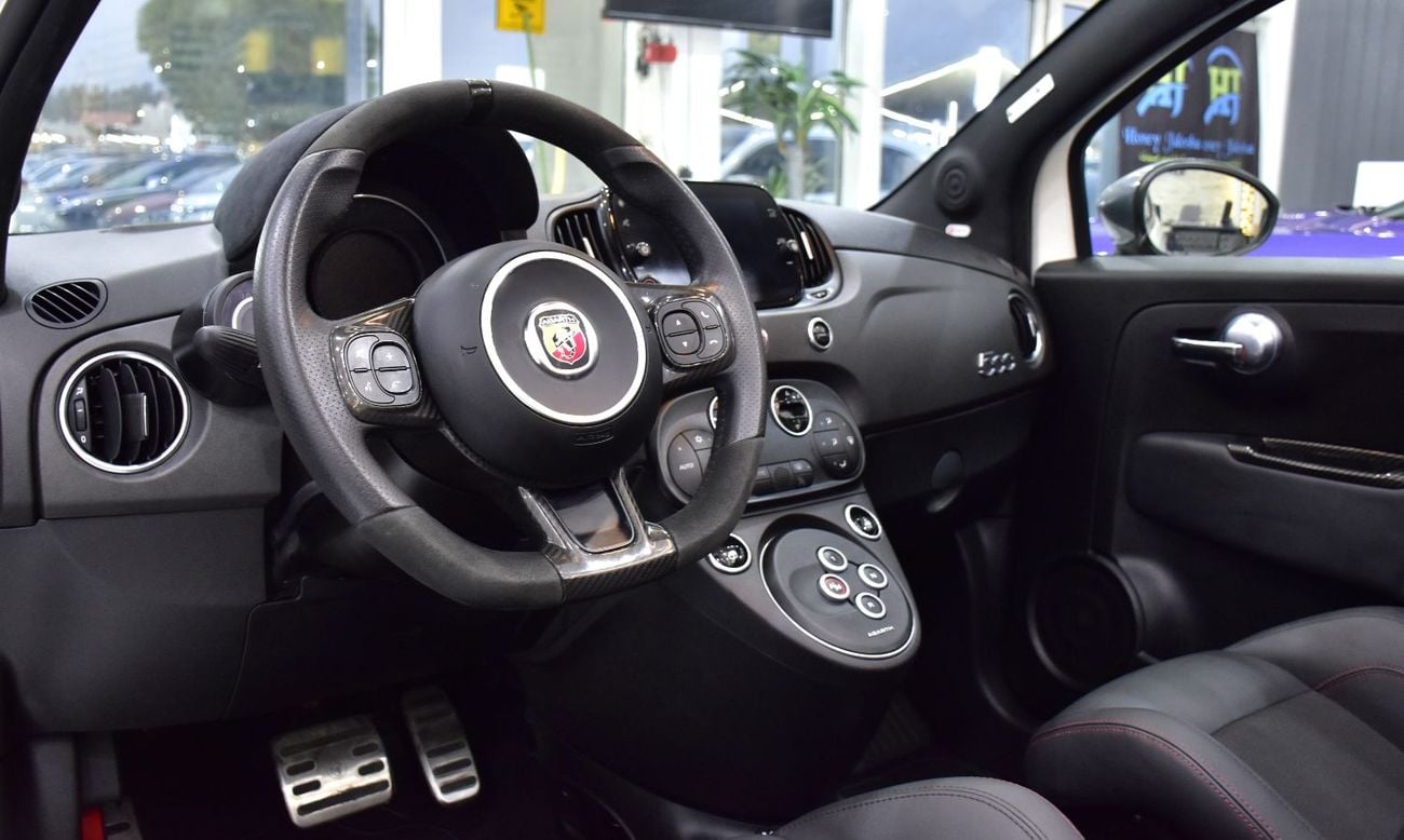 Abarth 595 EXCELLENT DEAL for our Abarth 595 Convertible Competizione ( 2022 Model ) in White Color GCC Specs