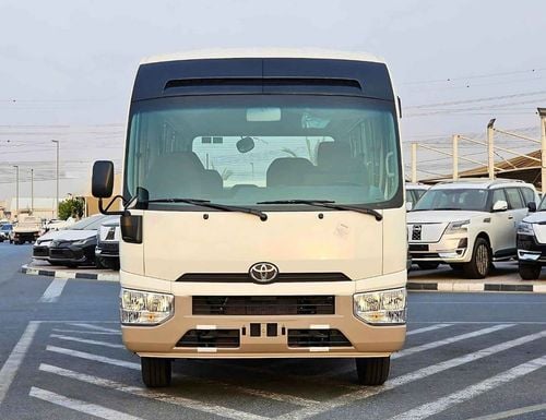Toyota Coaster 2.7L PETROL M/T DUAL TONE / 23 SEATER / AUTO DOOR / HLF LUGGAGE RACK (CODE#COPB)